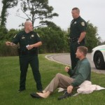 The golf course superintendent who saved he driver's life talks to sheriff deputies.