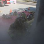 Firefighters prepare to enter the smoke-filled training building.